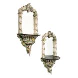 A PAIR OF GERMAN PORCELAIN MIRRORED WALL SCONCES