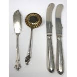 A VICTORIAN SILVER SAUCE LADLE