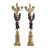 A PAIR OF FRENCH ORMOLU AND PATINATED BRONZE CANDELABRA