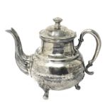 A SOUTH AMERICAN SILVER TEAPOT