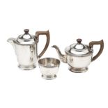 A GEORGE VI SILVER THREE-PIECE PART TEA SET