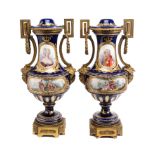 A PAIR OF ORMOLU-MOUNTED 'SEVRES ' STYLE LARGE VASES AND COVERS