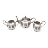 A THREE PIECE SILVER TEA-SET