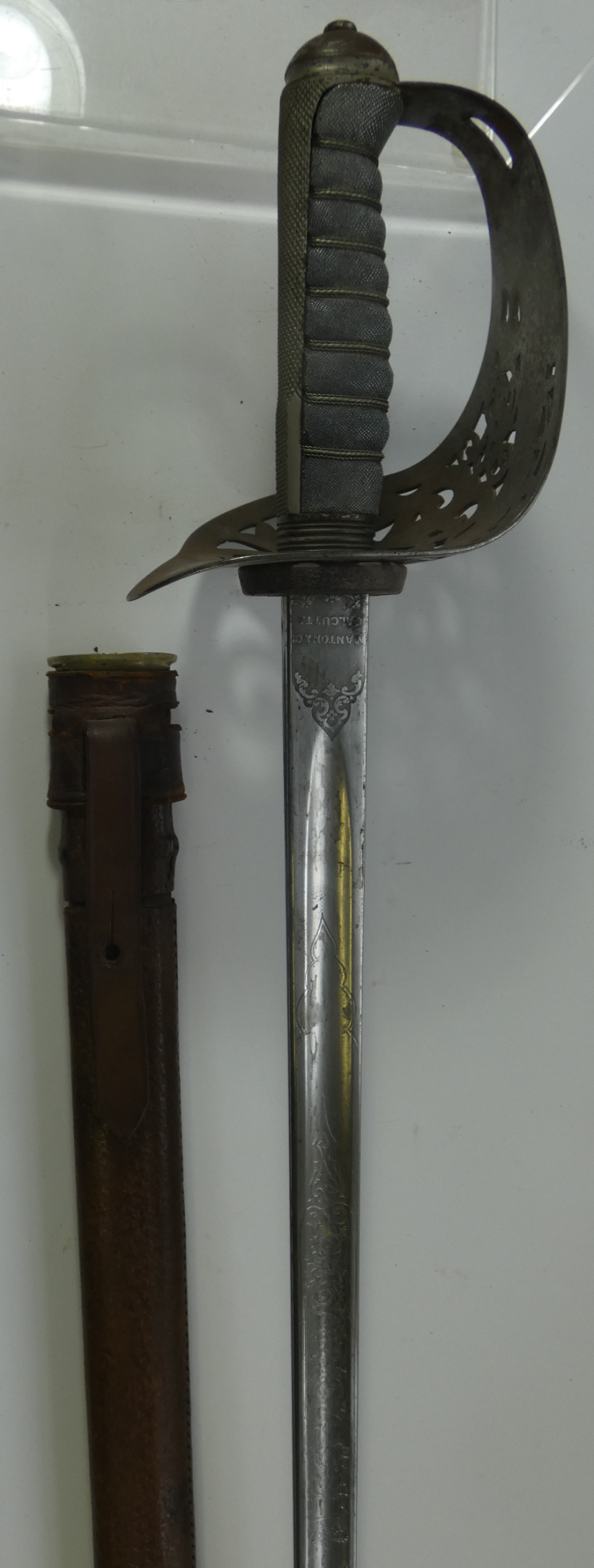 A VICTORIAN 1895 PATTERN INFANTRY OFFICER~S SWORD RETAILED BY MANTON & CO. CALCUTTA