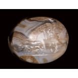 An eastern roman agate scaraboid engraved seal. The return of Dionysos. 2nd century A.D.