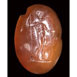 An italic carnelian intaglio. Standing male figure. 1st century B.C.