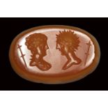 A roman agate intaglio. Two busts. 2nd - 3rd century A.D.