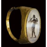 A late hellenistic banded agate intaglio set in an ancient gold ring. Venus Anadyomene3rd ce