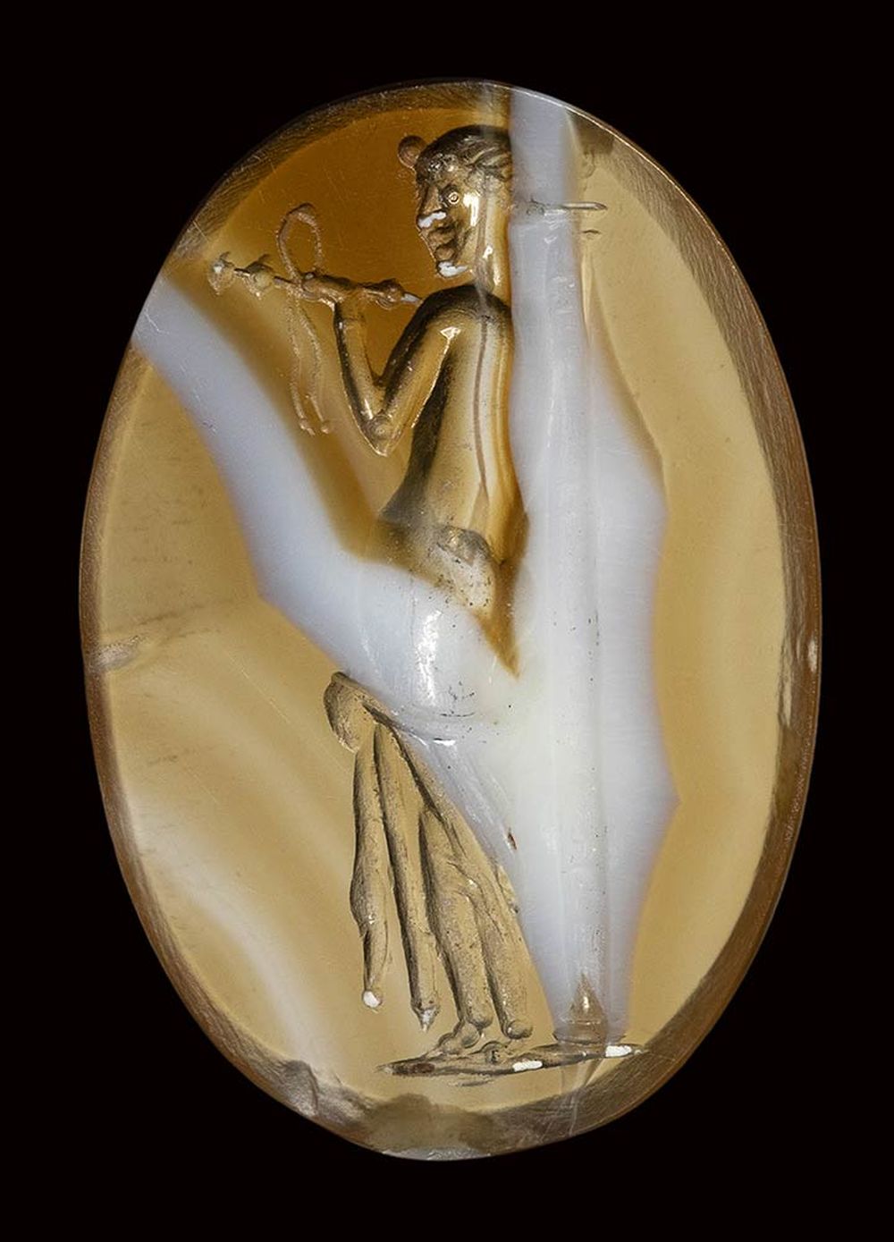 A large roman italic banded agate intaglio. Venus with a column.2nd century B.C.