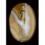 A large roman italic banded agate intaglio. Venus with a column.2nd century B.C.