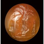 A roman italic carnelian intaglio. Palm tree with attributes.1st century B.C.