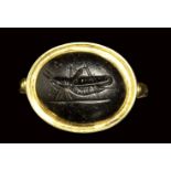 A roman dark agate intaglio set in a gold swivel ring. Grasshopper.1st century B.C. - 1st ce