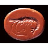 A roman red jasper intaglio. Shrimp. 1st century A.D.