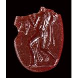 A fine roman carnelian fragmentary intaglio. Hercules with the bull. 1st century B.C.