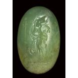 A large jadeite neoclassical intaglio. Dancing Maenad. Second half of 18th century.