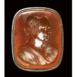 An important carnelian intaglio set in a silver ring. Portrait of Dr. R. Carmichael by Forster. <br