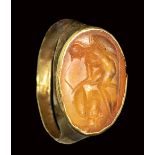 A roman carnelian intaglio set in an ancient gold ring. Warrior.1st - 2nd century A.D.