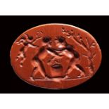 A roman red jasper intaglio. Fight scene. 2nd - 3rd century A.D.