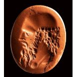 A roman red jasper intaglio. Bust of a philosopher.2nd century A.D.