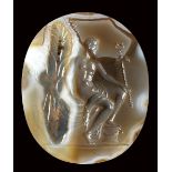 A large late renaissance agate intaglio. Seated Mercury.Early 17th century.