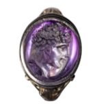 An exceptional greek hellenistic amethyst intaglio set in a late 19th century gold ring. Head of a Y