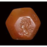 A roman magical carnelian intaglio. Bust of Mercury/Astrological symbols. 2nd - 3rd century