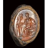 A fine roman carnelian intaglio set in a fragmentary iron ring. Diomedes with Palladium.1st