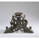 Inkwell held by classical gods and goddesses.