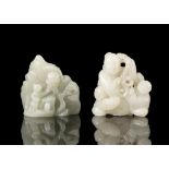 A GROUP OF TWO (2) JADE CARVINGS China, Modern One is carved as a Daoist immortal with the hehe /