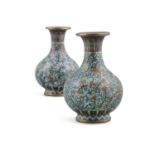 A NEAR PAIR OF MINIATURE CLOISONNE 'LOTUS' VASE China, Circa 1900 To be linked with the works