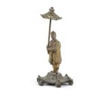 A BRONZE FIGURE OF A STANDING MANDARIN HOLDING AN UMBRELLA European work in the Chinese taste,