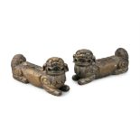 A PAIR OF WOODEN FU LIONS / BUDDHISTIC LIONS China, Circa 1900s-1930s Possibly elements of a bed