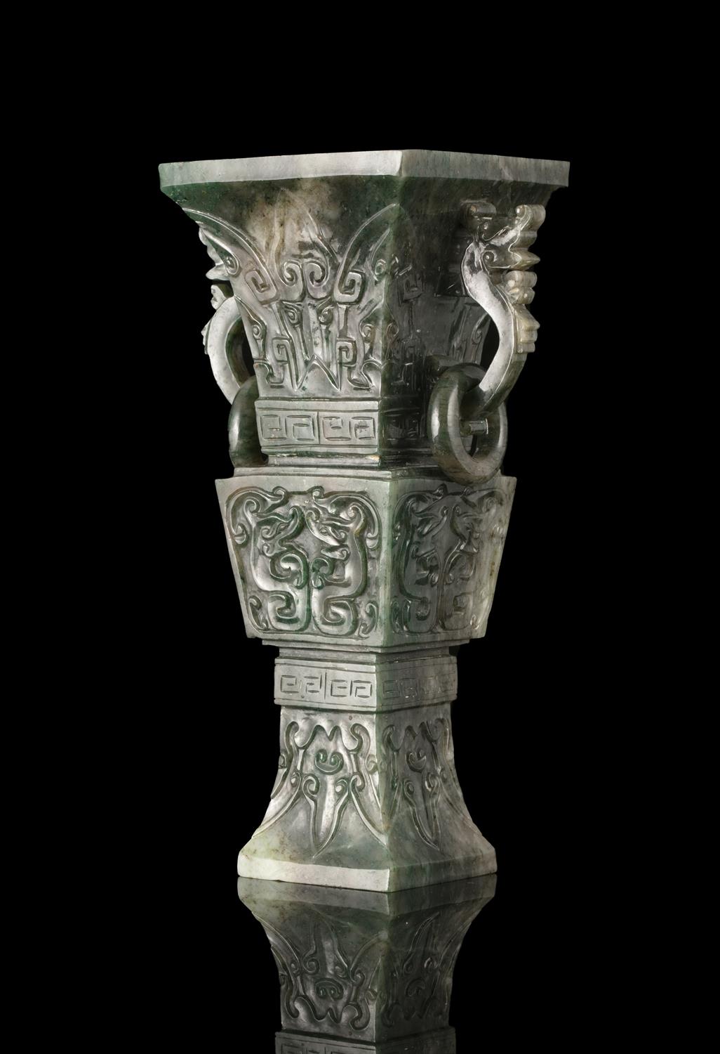 A JADE ARCHAISTIC VESSEL, GU China, 20th century Of archaistic gu shape, with two dragon handles