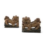 A GROUP OF TWO (2) GILT LACQUERED WOODEN FOO DOGS Southern China or Vietnam, Circa