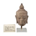 A PINK SANDSTONE BUDDHA’S HEAD Possibly Aura Kingdom and Burma / Myanmar 17th century With gilt