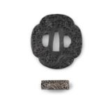 A MOKKO GATA TSUBA WITH SIGNATURE Japan, Meiji period Wrought iron, School of Omori,