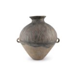 A PAINTED POTTERY TWO-HANDLED JAR Probably Neolithic period, Majiayao culture, Banshan type,