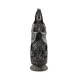 A HEAVY CASTED DARK PATINE BRONZE MODEL KANNON Japan, Circa 1900 The goddess of mercy is depicted