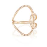 A DIAMOND DRESS RING, designed as two intertwined hoops pavé-set with brilliant-cut diamonds