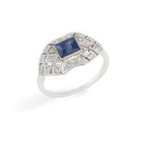 AN EARLY 20TH CENTURY SAPPHIRE AN DIAMOND DRESS RING, of openwork design, set with a central