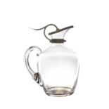 A GLASS CARAFE WITH SILVER MOUNTS, 19cm high