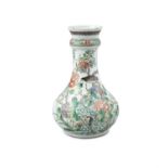 A CHINESE FAMILLE VERTE BALUSTER VASE WITH BULBOUS NECK, decorated with an exotic bird amongst