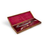 A CASED VICTORIAN HORN HANDLED CARVING SET, with silver collars Sheffield, c.1897,