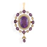 AN EARLY 20TH CENTURY AMETHYST AND SEED PEARL PENDANT/BROOCH, set with an oval-shaped amethyst