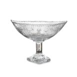 AN IRISH BOAT SHAPED CUT GLASS FRUIT BOWL, early 19th Century, on a lemon-squeeze square foot. 30.