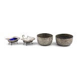 A COLLECTION, comprising a pair of Indian white metal circular bowls and a silver plated salt and