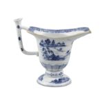 A CHINESE EXPORT BLUE AND WHITE HELMET SHAPED JUG, 18th Century, decorated in the willow pattern.