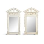 A PAIR OF GEORGIAN STYLE WHITE PAINTED PIER MIRRORS, in the style of William Kent, each with