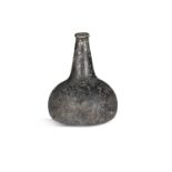 A 'GLASS ONION'/ ONION WINE BOTTLE, c.1700, of squat onion form and tapered spout. 17.5cm tall