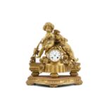 A FRENCH GILT BRONZE FIGURAL MANTLE CLOCK, 19th Century, surmounted with a winged cherub and a